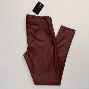 FashionNova leather pants .